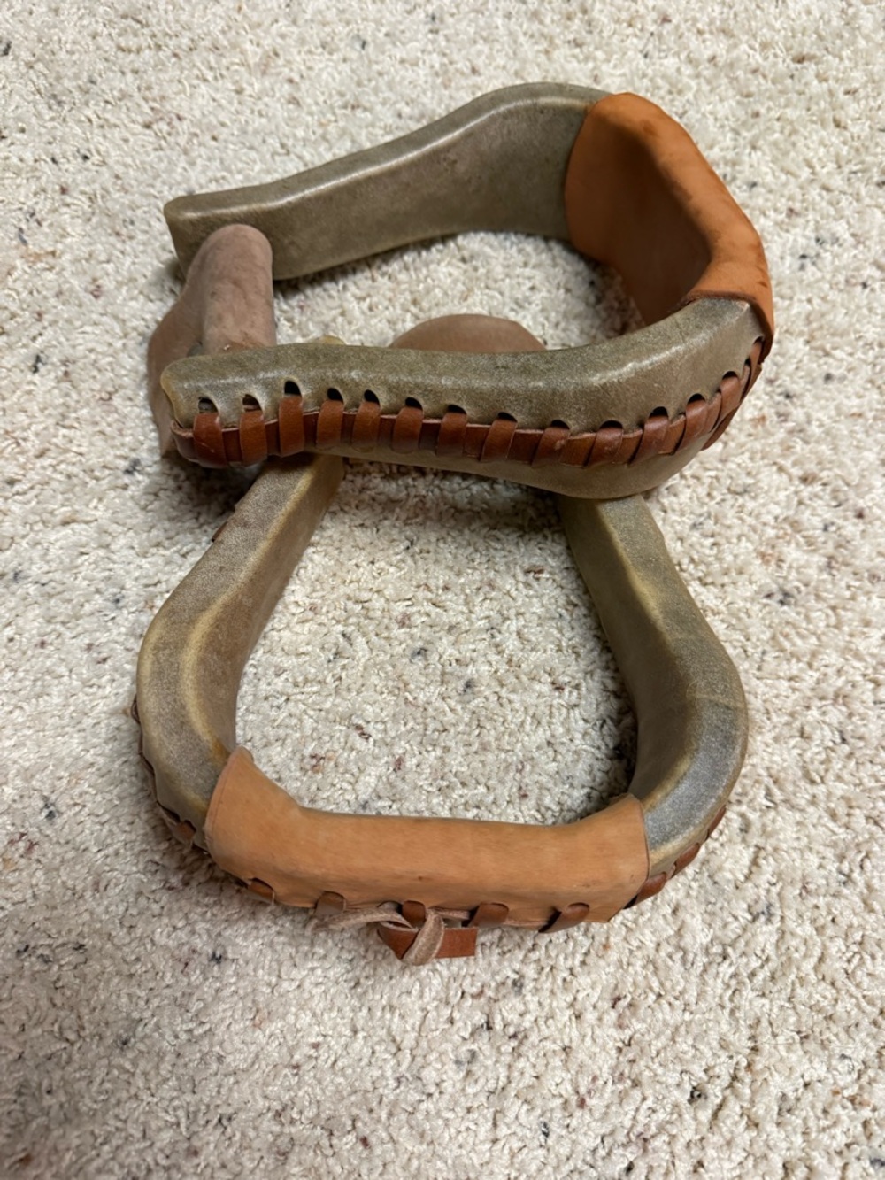 Rawhide wrapped stirrups